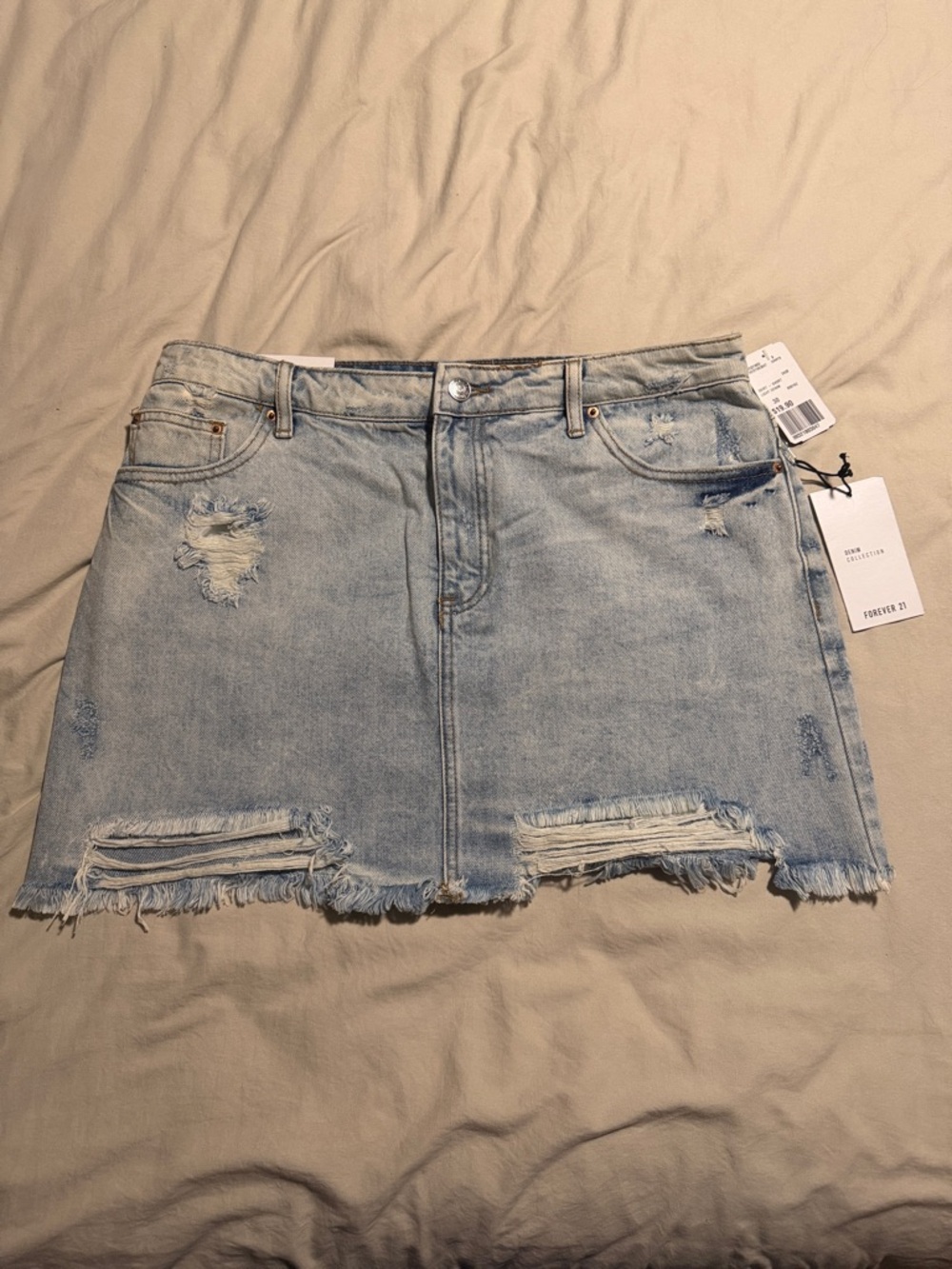 Forever 21 Light Wash Distressed Denim Mini Skirt